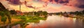 Sunset over Kwai river, Kanchanaburi, Thailand. Panorama Royalty Free Stock Photo