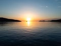 Sunset over kythnos island Merihas port Cyclades destination Greece