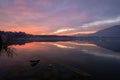 Sunset over the lake with beautiful sky and landscape reflections Royalty Free Stock Photo