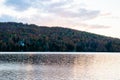 Sunset over lake during Indian Summer in Quebec, Canada Royalty Free Stock Photo