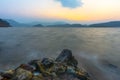 Sunset over the lake in the mountains in the summer Royalty Free Stock Photo