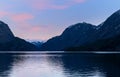 Sunset over Lake Sandvinvatnet from a campground in the town of Odda Royalty Free Stock Photo