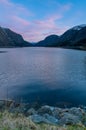 Sunset over Lake Sandvinvatnet from a campground in the town of Odda Royalty Free Stock Photo