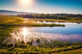 Sunset over the lake. Serene lake in the evening