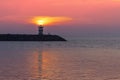 Sunset over the lighthouse Royalty Free Stock Photo