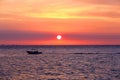 Sunset over Madagascar Nosy be beach with boat silhouette Royalty Free Stock Photo