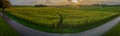 Sunset over the maize labyrinth:a panoramic countryside view. Royalty Free Stock Photo