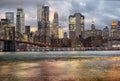 Sunset over Manhattan with brooklyn bridge. Cityscape of New York Royalty Free Stock Photo