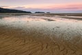 Sunset over Marahau Beach in Abel Tasman National Park, South Island, New Zealand Royalty Free Stock Photo