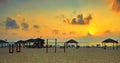 Sunset over the Mediterranean Sea, seashore with a beach. Summer evening