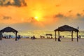 Sunset over the Mediterranean Sea, seashore with a beach. Summer evening