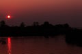 Sunset over the Mekong River near the island of Don Det in the Mekong Delta