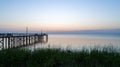 Sunset over Mobile Bay on the Alabama Gulf Coast seascape at Daphne Bayfront Park Pavilion pier Royalty Free Stock Photo