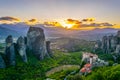 Sunset over monasteries of Roussanou and Saint Nicholas Anapavsa at Meteora, Greece Royalty Free Stock Photo