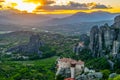 Sunset over monasteries of Roussanou and Saint Nicholas Anapavsa at Meteora, Greece Royalty Free Stock Photo