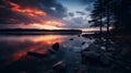 Sunset over moody lake in scenic view Royalty Free Stock Photo