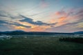 Sunset over Moody Tupper Lake NY Adirondacks in early fall aerial Royalty Free Stock Photo