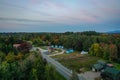 Sunset over Moody Tupper Lake NY Adirondacks in early fall aerial Royalty Free Stock Photo