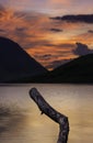 Sunset over mountain lake in Lake District UK Royalty Free Stock Photo