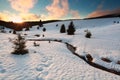 Sunset over mountain river in winter Royalty Free Stock Photo
