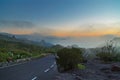 Sunset over the mountains in the clouds Royalty Free Stock Photo