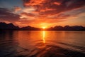 sunset over mountains and lake Wispy Clouds Over Lake at Sunset