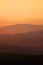 Sunset over mountains ridges Royalty Free Stock Photo