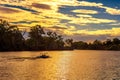 Sunset over Murray river with a boat in Mildura, Australia