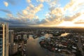 Sunset over city at river high-rise view Royalty Free Stock Photo