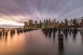 Sunset over the New York City skyline from  the Brooklyn Bridge Park. Royalty Free Stock Photo