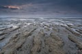 Sunset over North sea coast at low tide Royalty Free Stock Photo