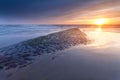Sunset over North sea coast in Netherlands Royalty Free Stock Photo
