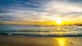 Sunset over the ocean horizon and beach on a nice winter day viewed from Camps Bay Royalty Free Stock Photo
