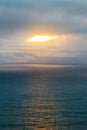 Sunset over the ocean with reflection in water Royalty Free Stock Photo