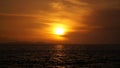 Sunset over the ocean with thunder clouds near Corinth, Greece.