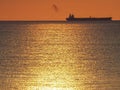 Boat and setting sun over the ocean Curacao Views Royalty Free Stock Photo