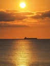 Boat and setting sun over the ocean Curacao Views Royalty Free Stock Photo