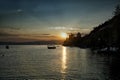 Sunset over Ohrid Lake with silhouette of the Saint John the Theologian, Kaneo church against dramatic sky. Royalty Free Stock Photo