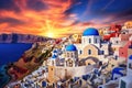 Sunset over Oia village on Santorini island, Greece, Beautiful view of Churches in Oia village, Santorini island in Greece at Royalty Free Stock Photo