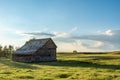 Sunset over old, abandoned barn in a prairie pasture at sunset in Saskatchewan, Canada Royalty Free Stock Photo