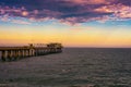 Sunset over the old historic jetty in Swakopmund, Namibia