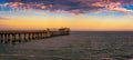 Sunset over the old historic jetty in Swakopmund, Namibia