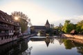 Sunset over old medieval bridge over Pegnitz river in Nuremberg, Germany Royalty Free Stock Photo