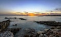 Sunset over old pier in the sea in south Athens Royalty Free Stock Photo