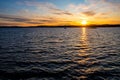 Sunset over Oslofjord harbor with Oslo Bygdoy peninsula seashore in background near Oslo, Ostlandet region in Norway Royalty Free Stock Photo