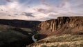 Sunset over the Owyhee River with rock cliffs Royalty Free Stock Photo