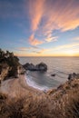 Sunset over the Pacific Ocean and McWay Falls in Big Sur, California Royalty Free Stock Photo