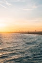 Sunset over the Pacific Ocean in Seal Beach, California Royalty Free Stock Photo