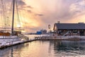 Sunset over the patio on the lake at Amsterdam BrewHouse and the Empire Sandy cruise boat.