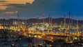 Sunset over Petrochemical refinery with mountain background Royalty Free Stock Photo